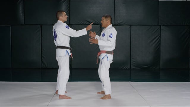 Finger pointing threat or single-hand neck grab defense