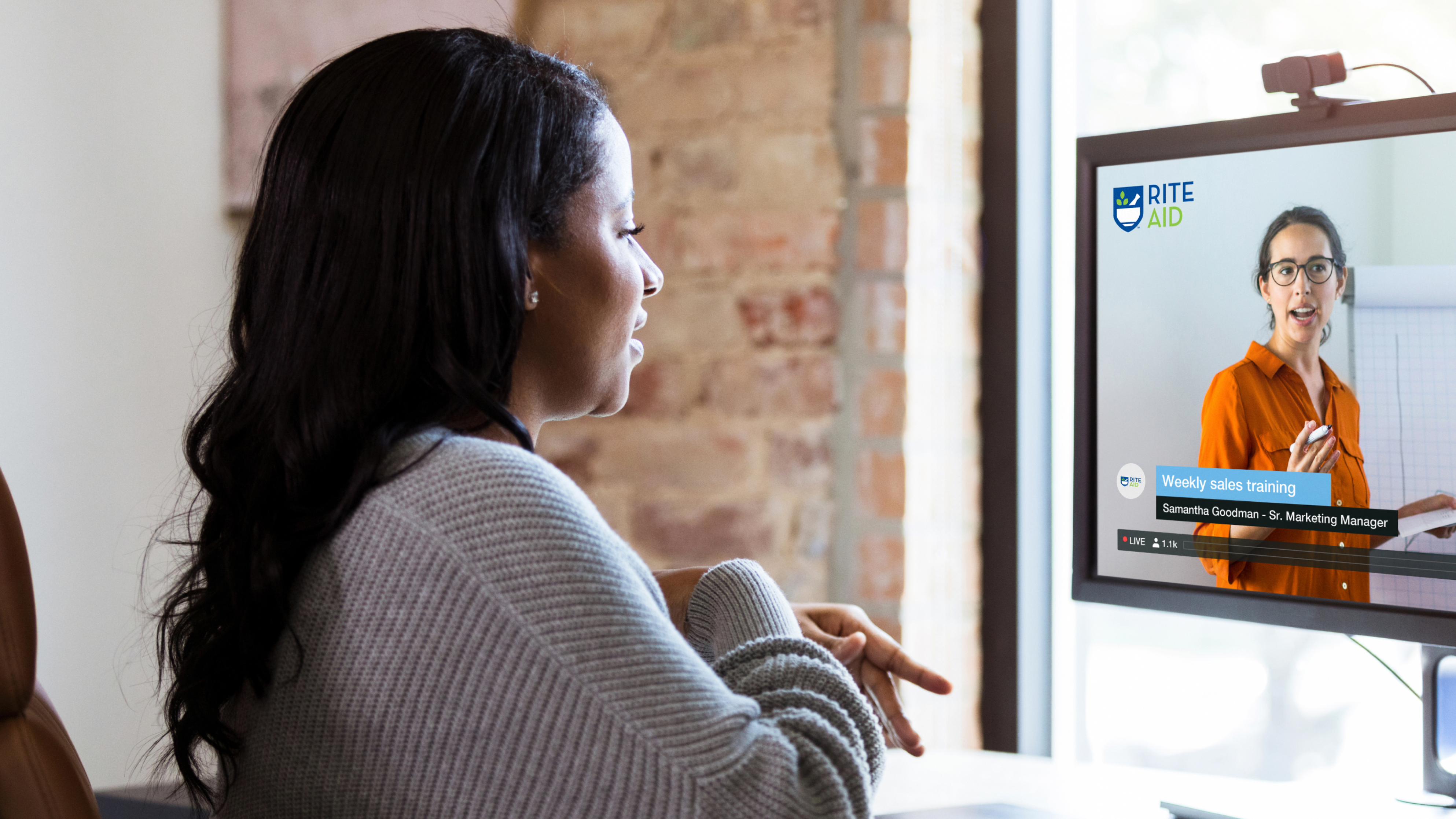 Woman watching a Rite-Aid event on her computer screen