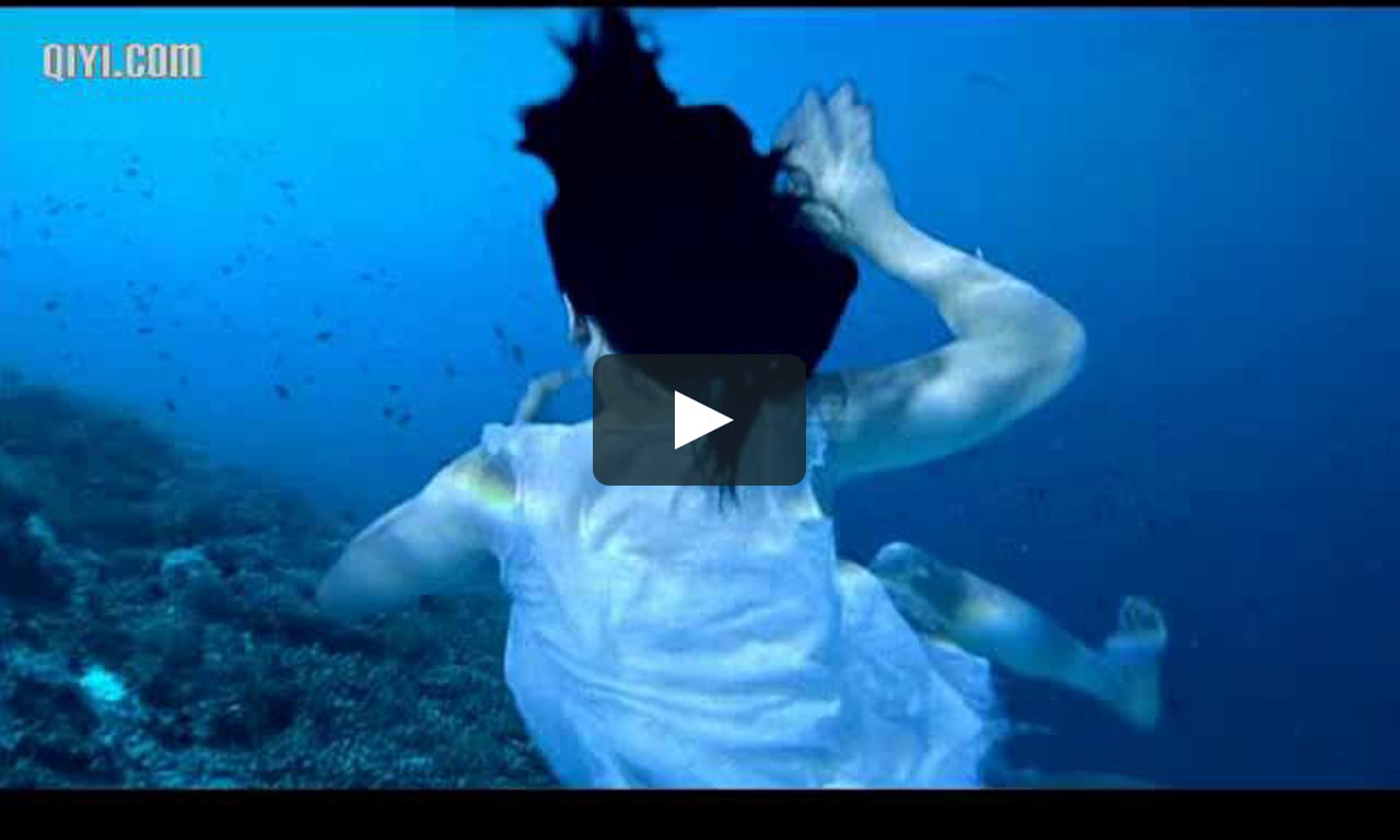 A fully clothed guy saved a drowning girl underwater.