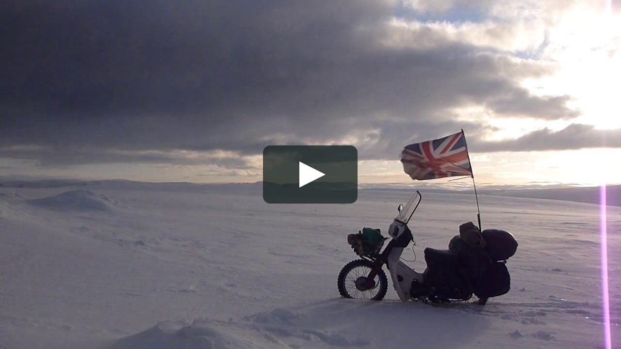 Riding a Honda C90 motorcycle through the Arctic Circle in Winter (music vi...