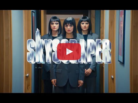AUTOMATIC send up American corporate culture in new video for "Skyscraper"