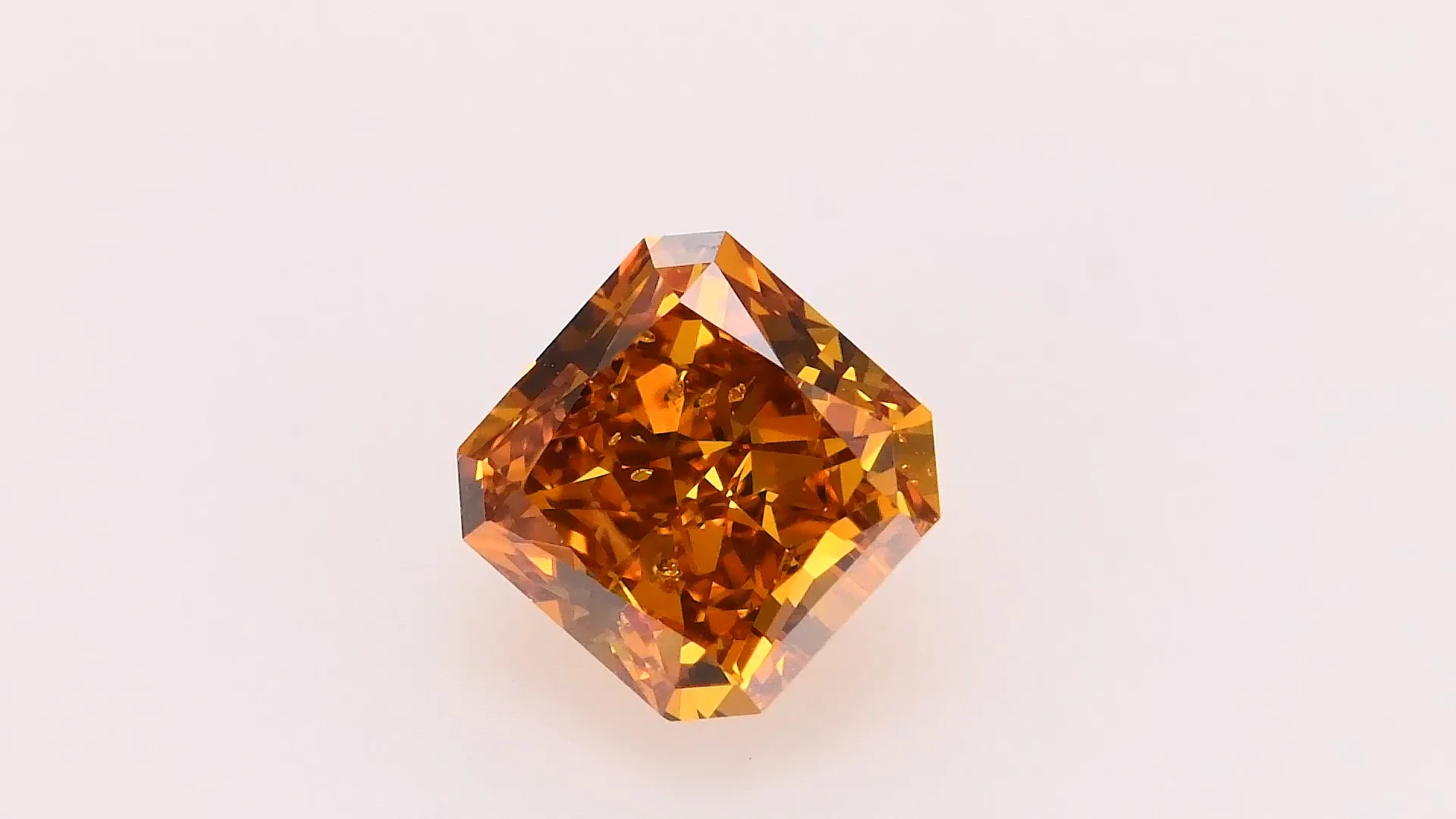 0.54 Carat Fancy Deep Brownish Yellowish Orange Radiant Diamond I1