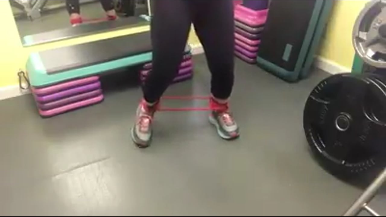 Exercise weight loss-stepping toe taps with tubing