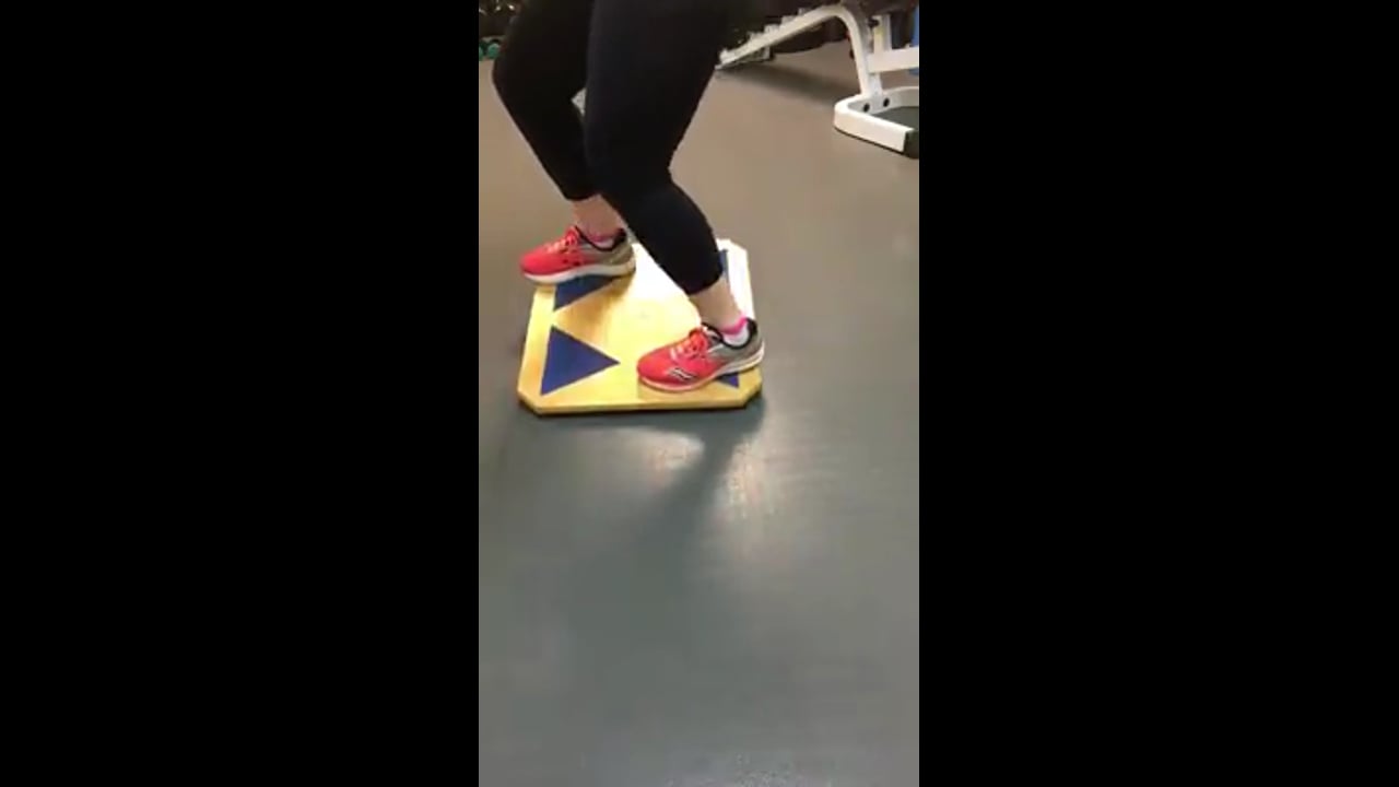 Weight loss workout-wobble board squats-diagonal corners