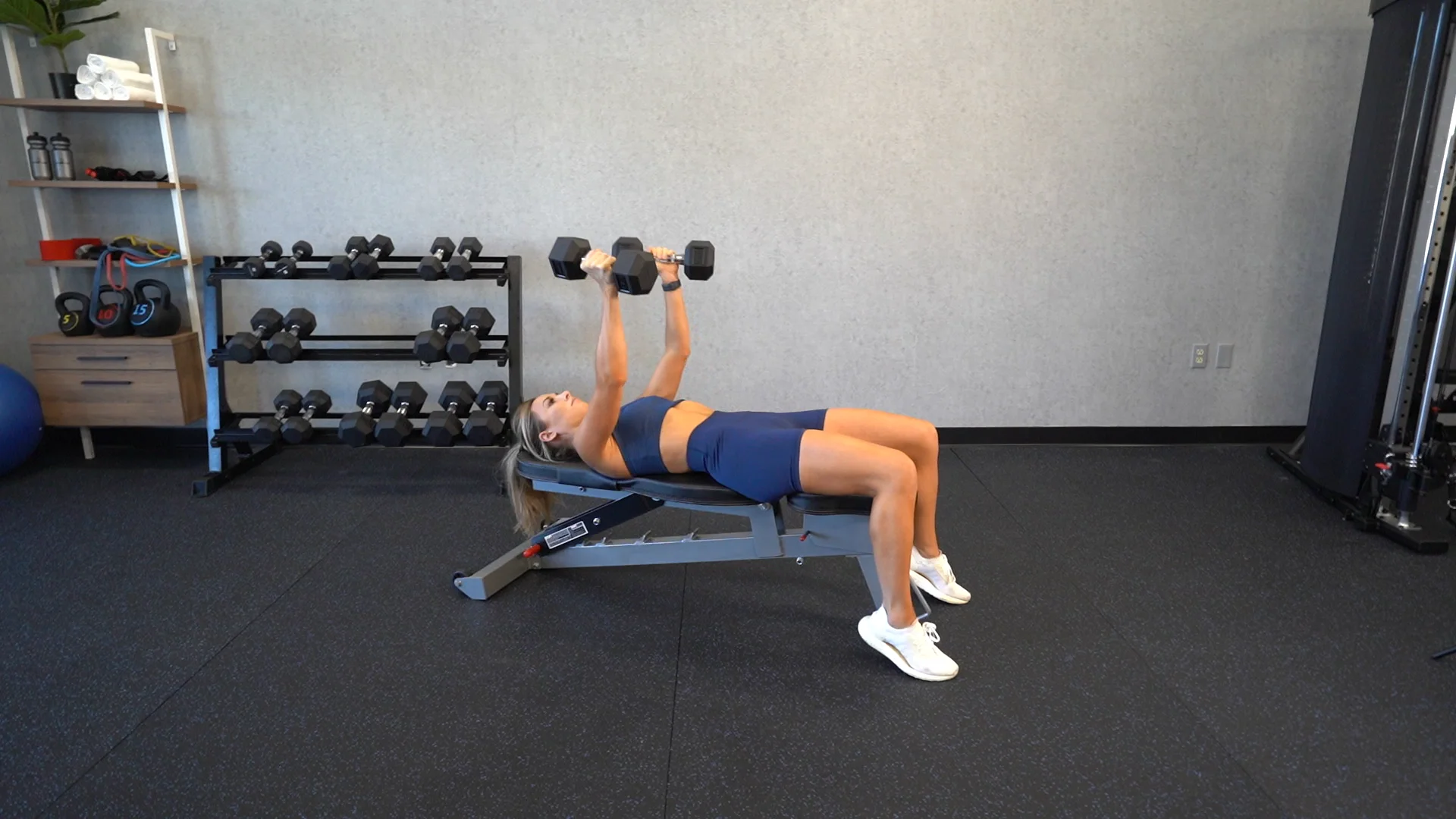 Dumbbell chest outlet press with rotation