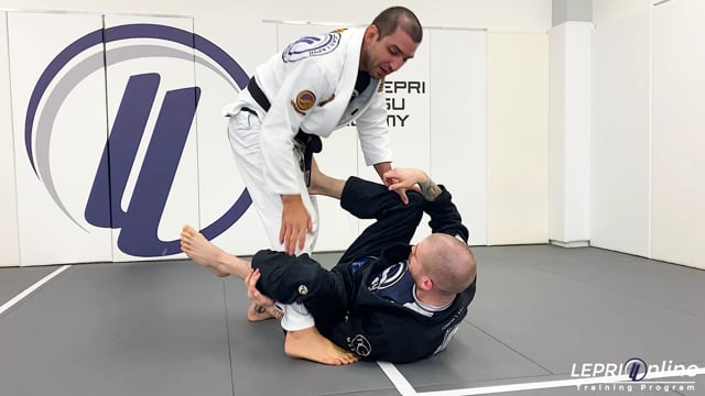 De La Riva Guard Pass Variation When Opponent Under Hooks the Leg to 50/50 Escape