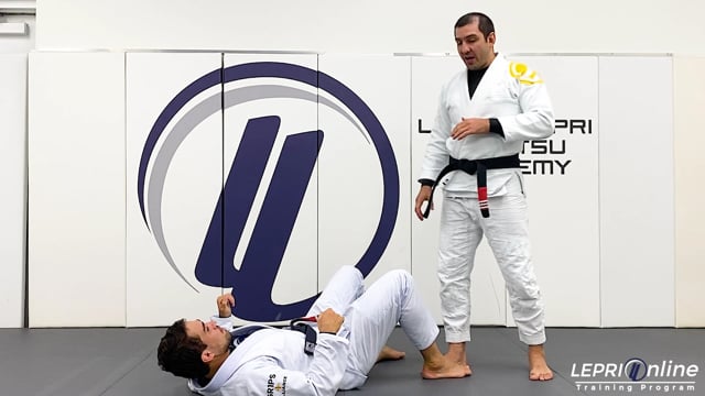 Half Guard Pass by Changing Base to Back Take