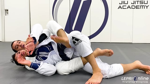 Half Guard Pass by Changing Base to Back Take Variation