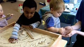 Mark making in the sand