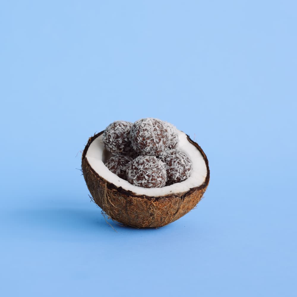 Nomz Coconut Bites in Coconut