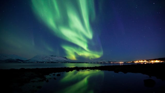 Flowing Auroras Over Norway