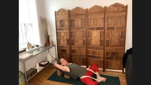 Supta Baddha Konasana (reclined bound angle pose) - instructional video with 2 blocks, 1 bolster, 1 blanket and 1 belt