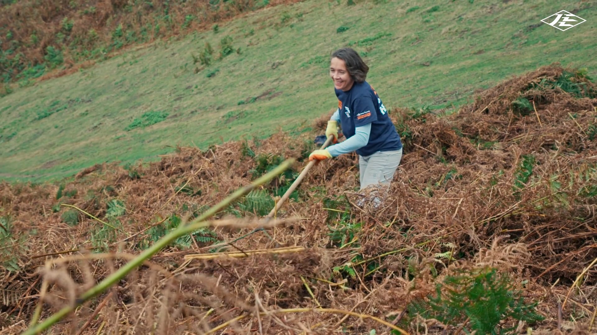 Women plants tree at Mourier Valley
