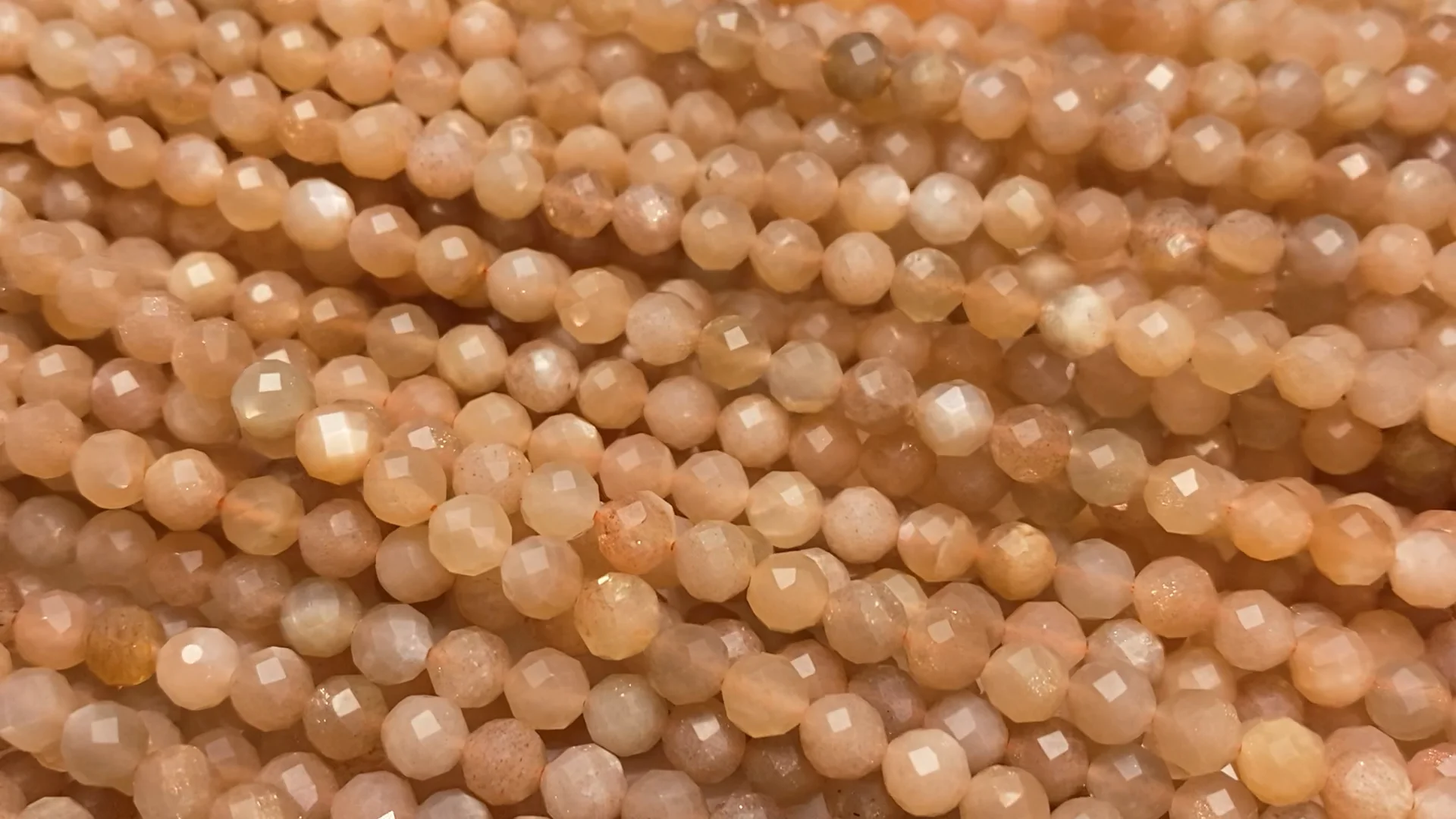 動画】【素晴らしい輝き】オレンジムーンストーンAAA- ラウンドカット