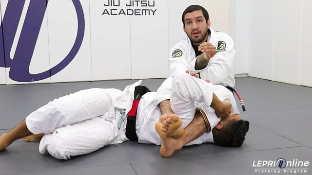 Guard Pull to Armbar when Opponent Locks Arms to Defend