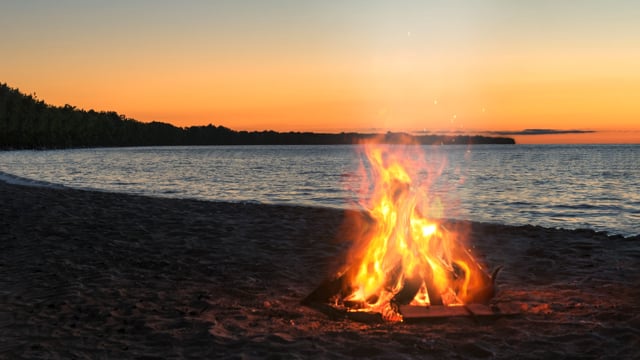 Campfire at the Lake Shore at Sunset