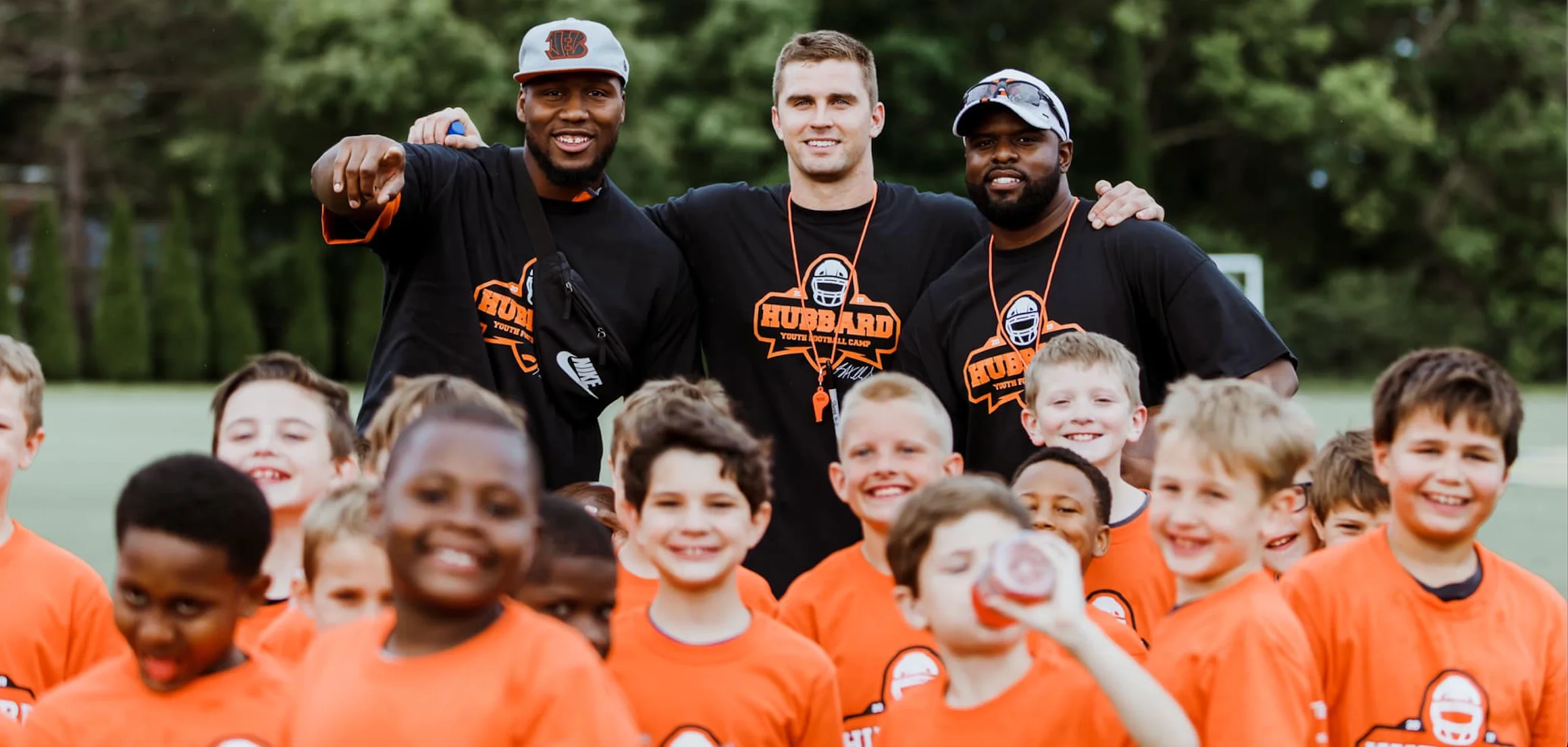 PHOTOS: Bengal Sam Hubbard leads football camp at Moeller