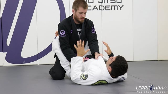 Closed Guard to Omoplata Variation When Opponent Rolls