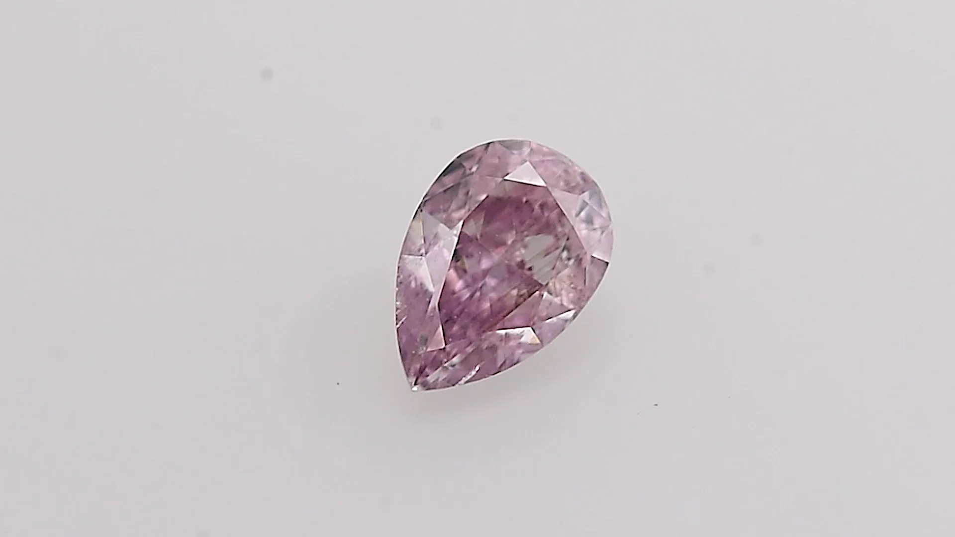 0.25 Carat Fancy Intense Purplish Pink Pear Diamond SI2 GIA