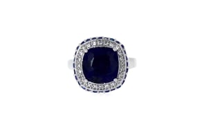 5.70 ct. t.w. Sapphire and .10 ct. t.w. White Topaz Ring in Sterling Silver