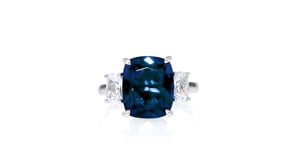 6.25 Carat Simulated Sapphire and 1.10 ct. t.w. CZ Three-Stone Ring in Sterling Silver