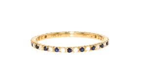 18 ct. t.w. Sapphire and .13 ct. t.w. Diamond Eternity Band Ring in 14kt Yellow Gold