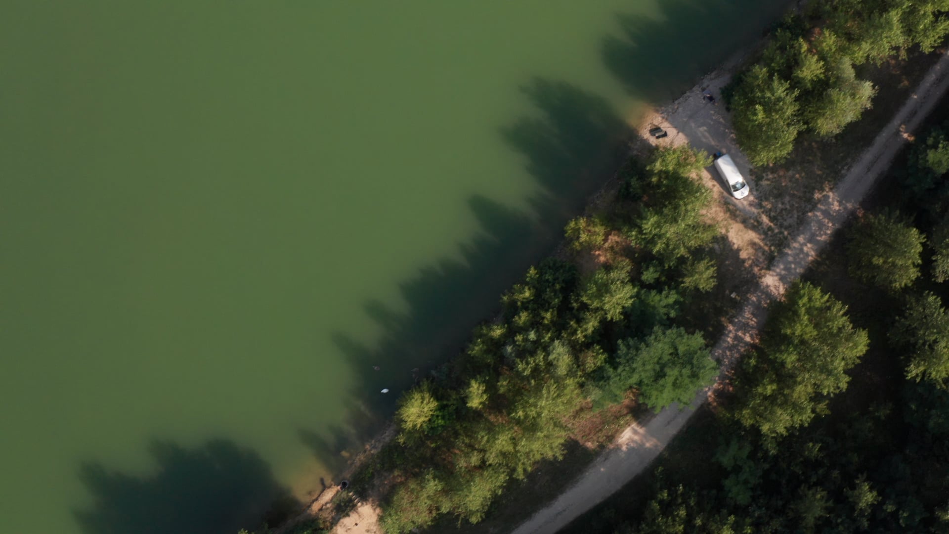 Road by the lake top view