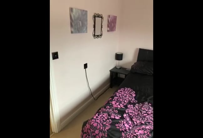 Video 1: Your room inc double bed and bedside table.