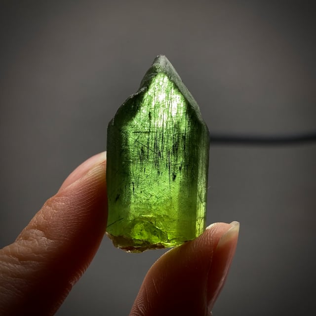 Peridot with Ludwigite inclusions