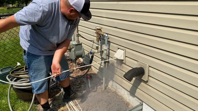 What is the best way to clean out a dryer vent?