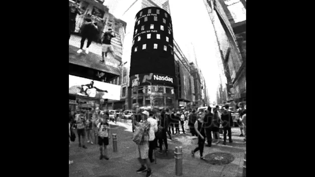 New York, USA. 14th Apr, 2021. Workers and supporters outside the giant  video screen on the Nasdaq stock exchange in Times Square in New York  decorated for the debut of the Coinbase