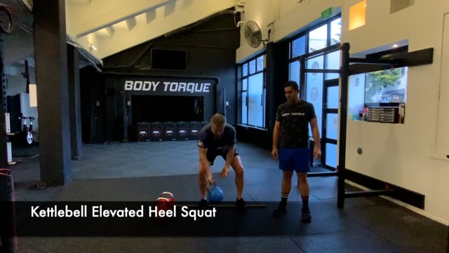 Kettlebell Elevated Heel Squat