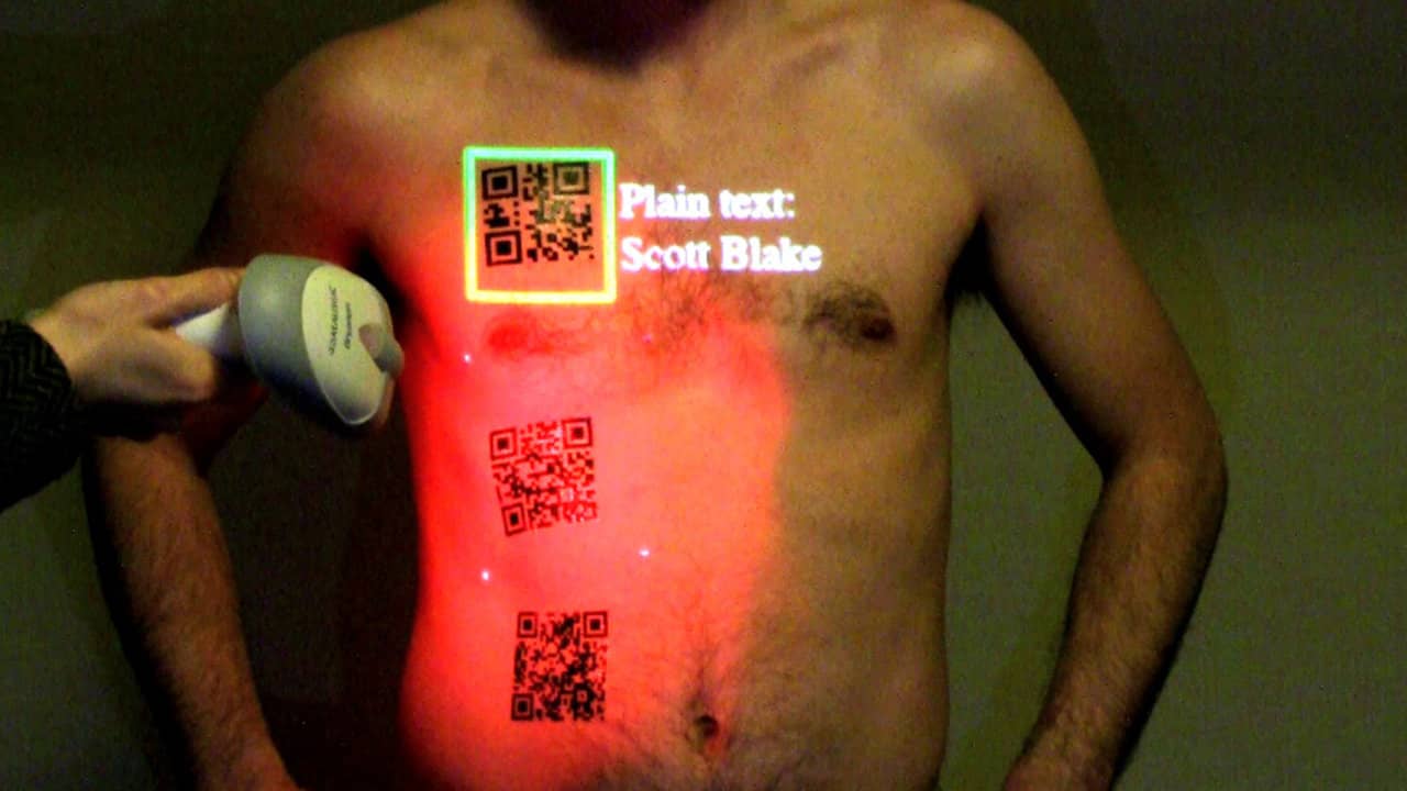 Scanning QR Code Tattoos with Video Mapping Interface on Vimeo