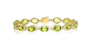 12.00 ct. t.w. Oval Bezel-Set Peridot Bracelet in 14kt Yellow Gold