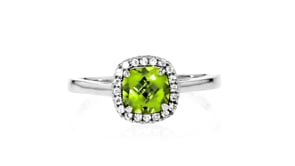 1.00 Carat Peridot and .10 ct. t.w. White Topaz Ring in Sterling Silver