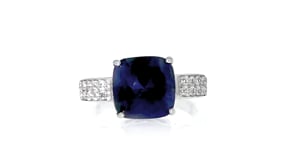5.25 Carat Sapphire and .30 ct. t.w. White Topaz Ring in Sterling Silver