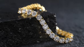 23.00 ct. t.w. CZ Tennis Bracelet in 18kt Gold Over Sterling