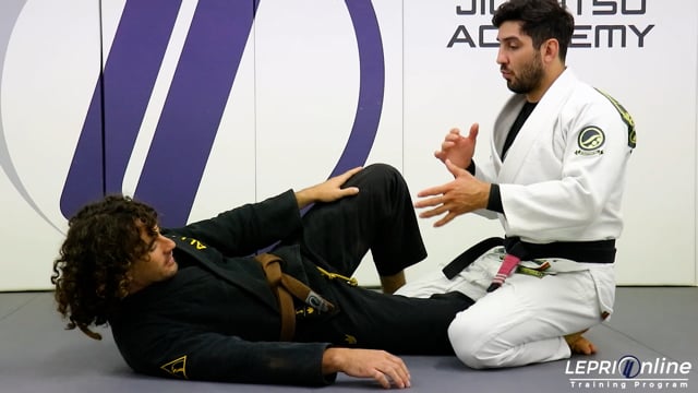 Half Guard Escape to Lapel Choke