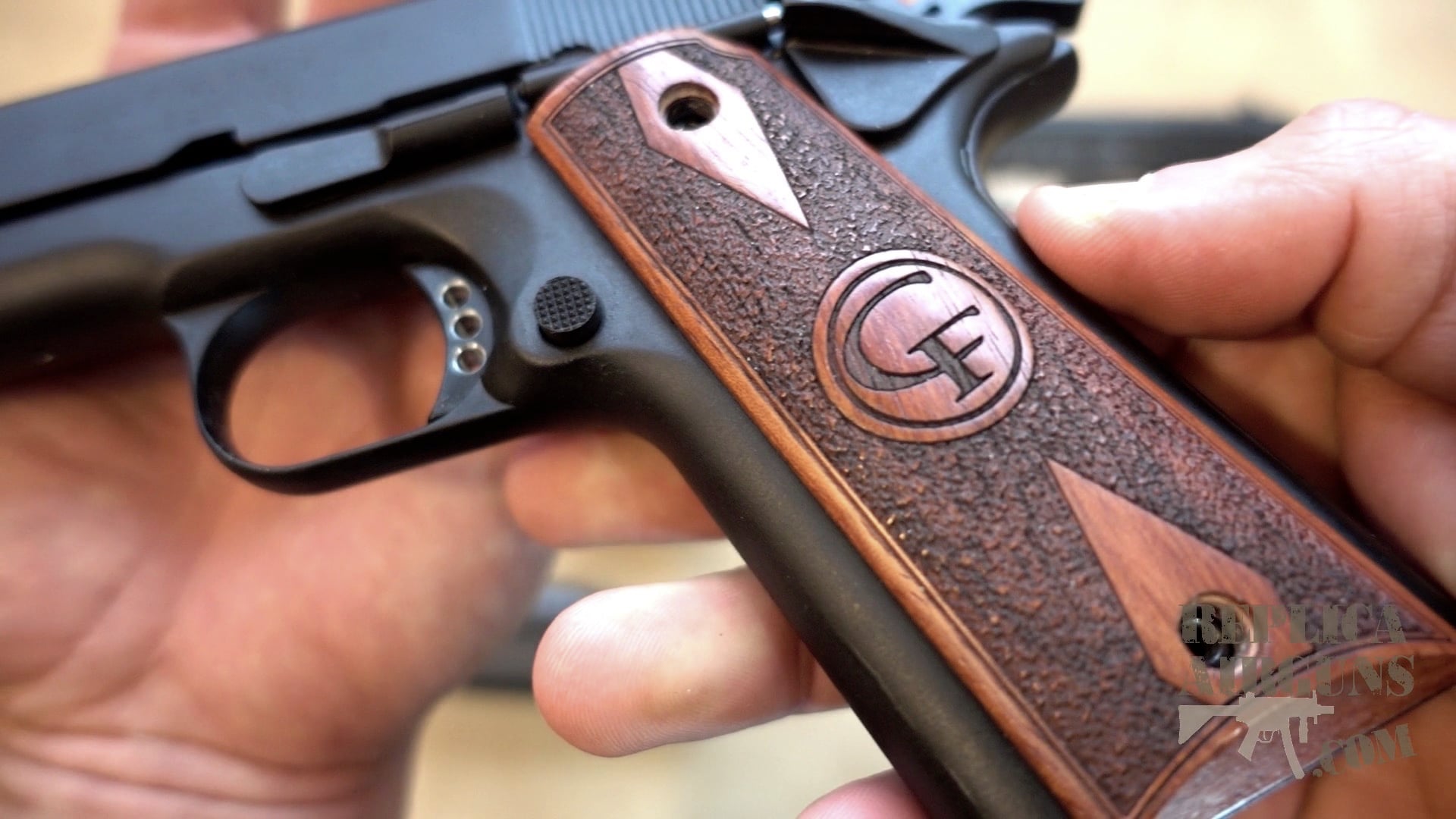 Can I put real 1911 Grips on my KWCCybergun 1911 BBAirsoft Gun