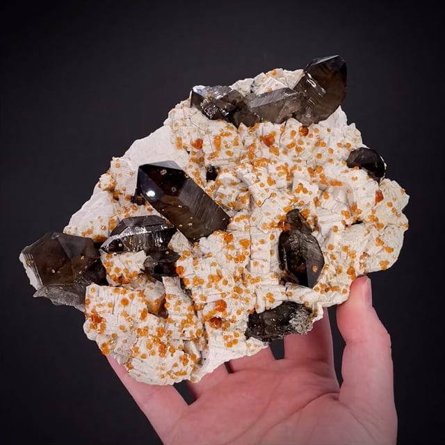 Spessartine Garnet and Smoky Quartz on Feldspar
