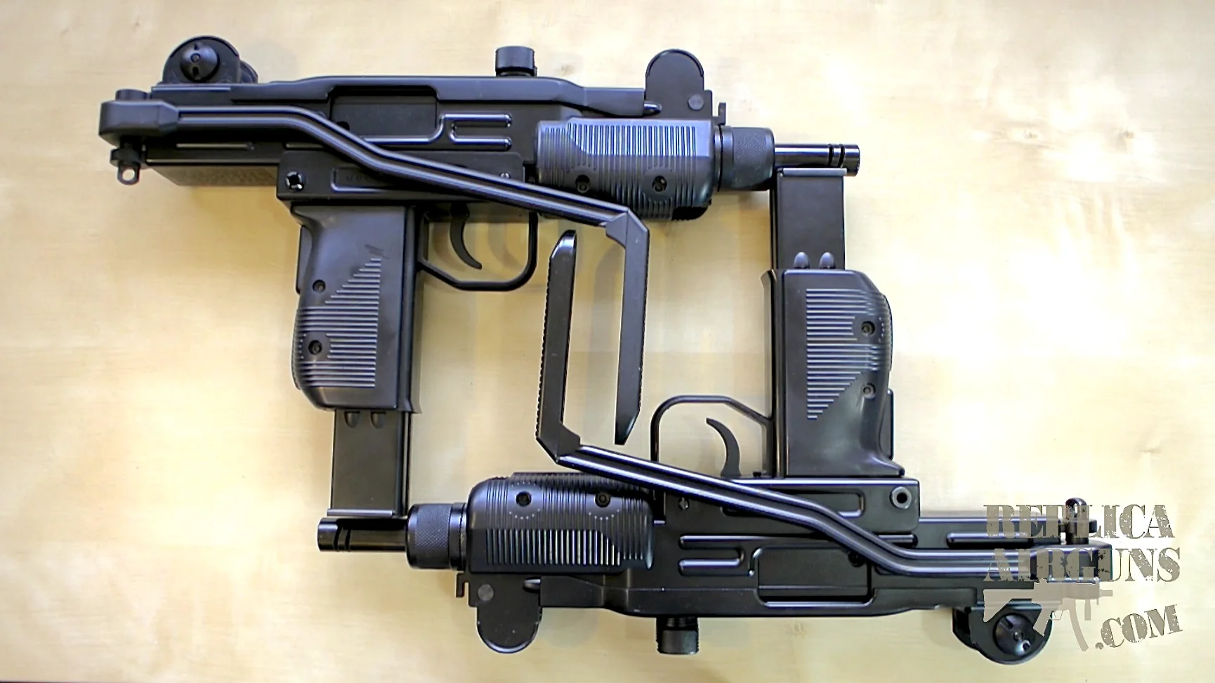 KWC Mini UZI BB Versus Airsoft Comparison Review - Table Top on Vimeo