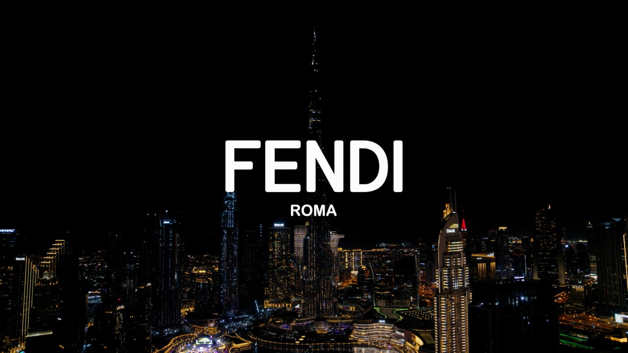 FENDI Roma logo projected over the Downtown Dubai skyline at night