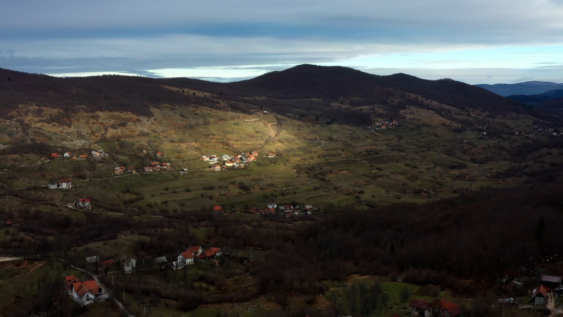 Mountain village sun ray