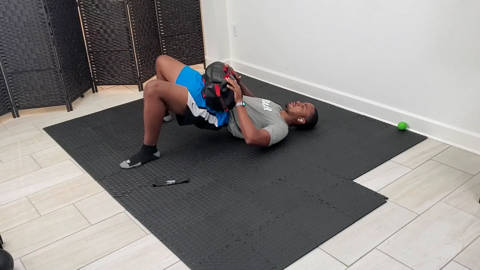 Loaded Sandbag Glute Bridge on Vimeo