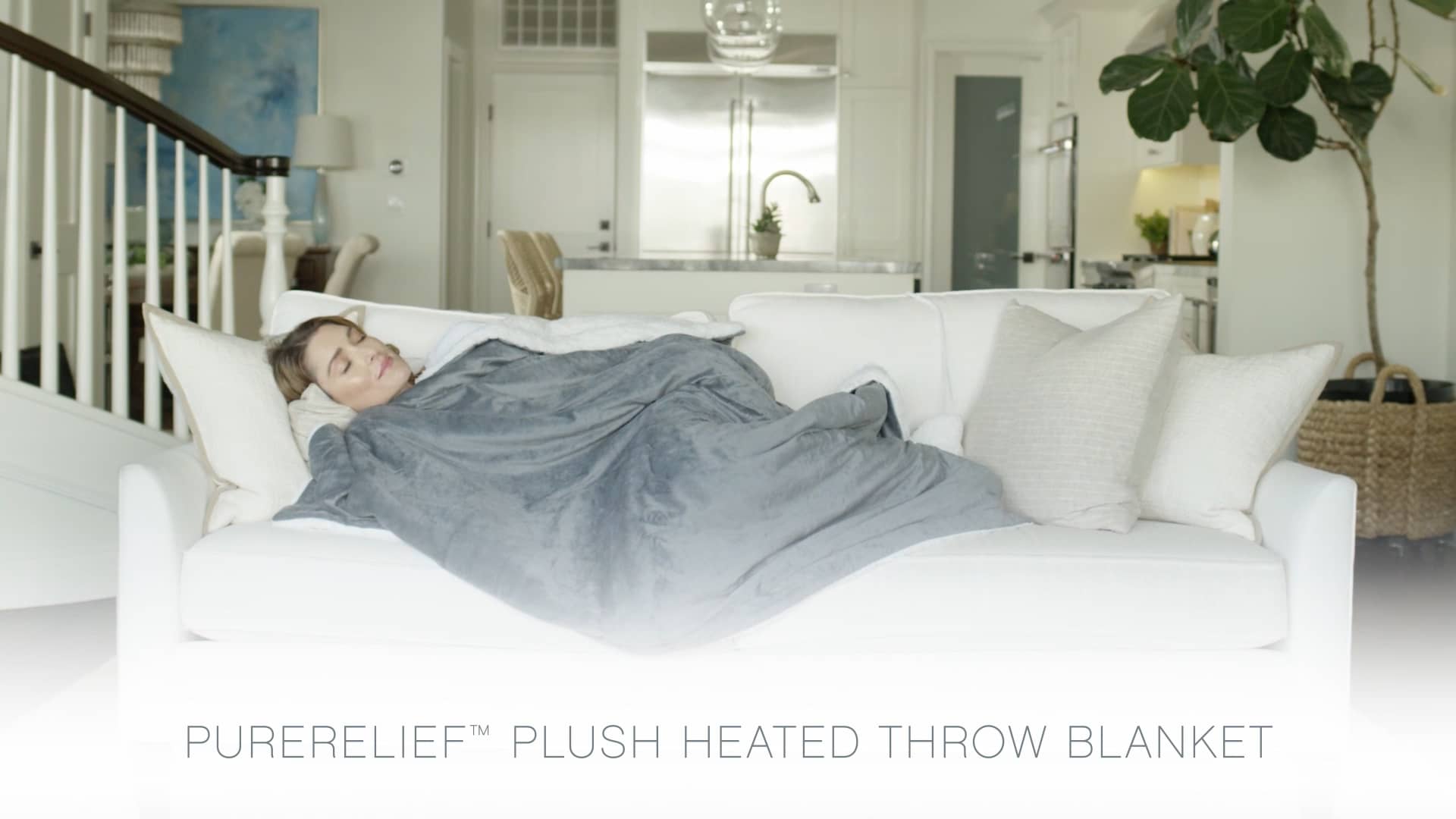 PureRelief™ Plush Heated Throw Blanket on Vimeo