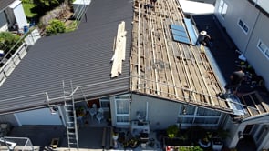 Re-roofing in progress