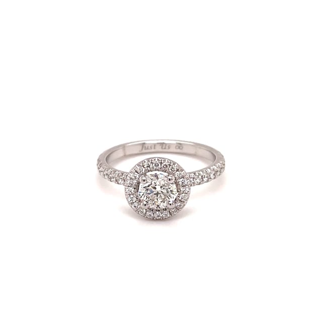 0.70 carat solitaire halo ring in white gold with round diamonds