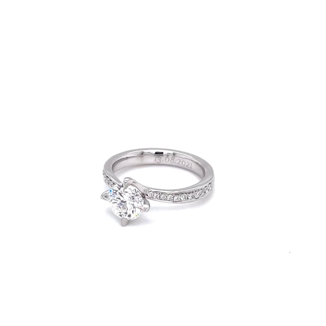 0.50 carat solitaire diamond ring in white gold with side diamonds