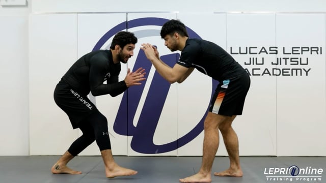 Standing Bicep Control to Side Step/Duck Under to Back Control