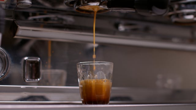 A beautiful espresso machine brewing a rich fresh cup of espresso.